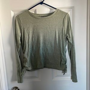 Art Class Green long sleeve t-shirt cinched sides.